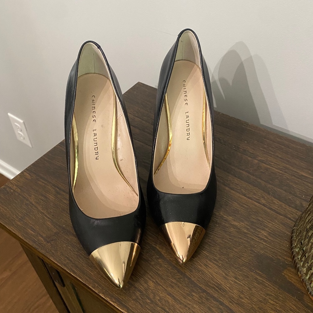 Gold pointed heels